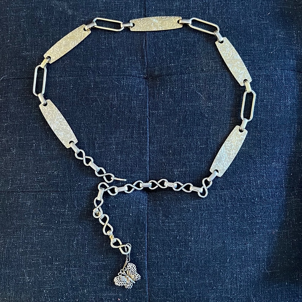 Vintage metal belt with butterfly pendant